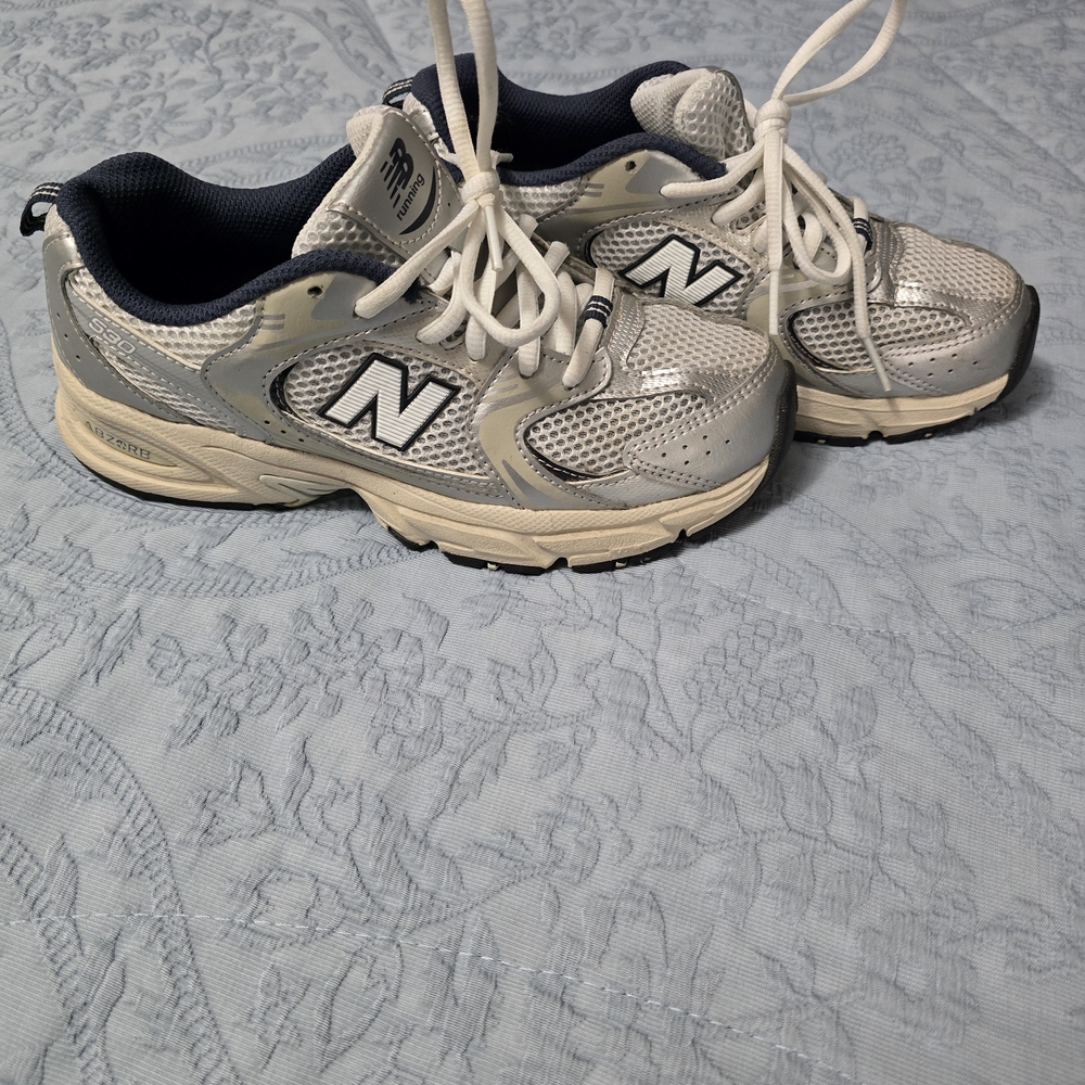 New Balance Silver and White Sneakers